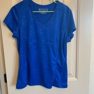 Tek Gear blue woman’s shirt excellent condition.